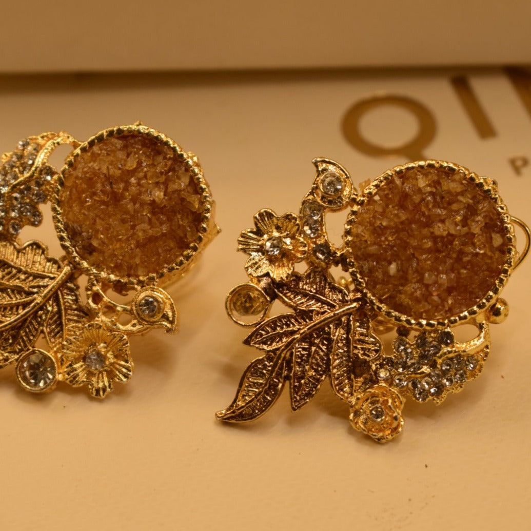 Fancy Leaf Design Golden White/Maroon/Green/Black/Shampion/Pink/Blue/ Stones Earrings For Girls/women.