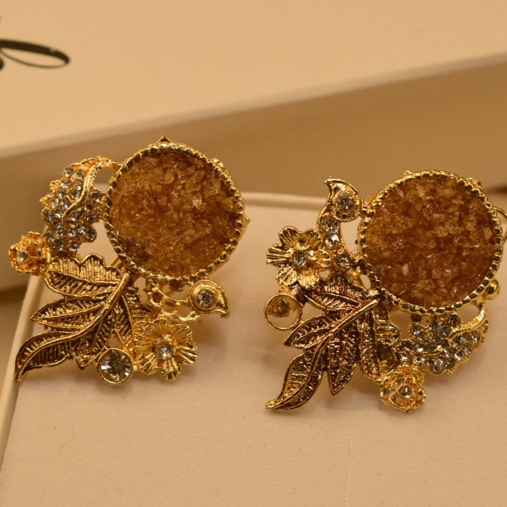 Fancy Leaf Design Golden White/Maroon/Green/Black/Shampion/Pink/Blue/ Stones Earrings For Girls/women.