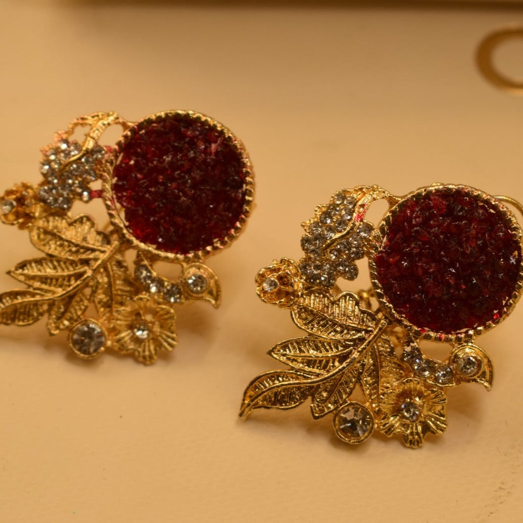 Fancy Leaf Design Golden White/Maroon/Green/Black/Shampion/Pink/Blue/ Stones Earrings For Girls/women.