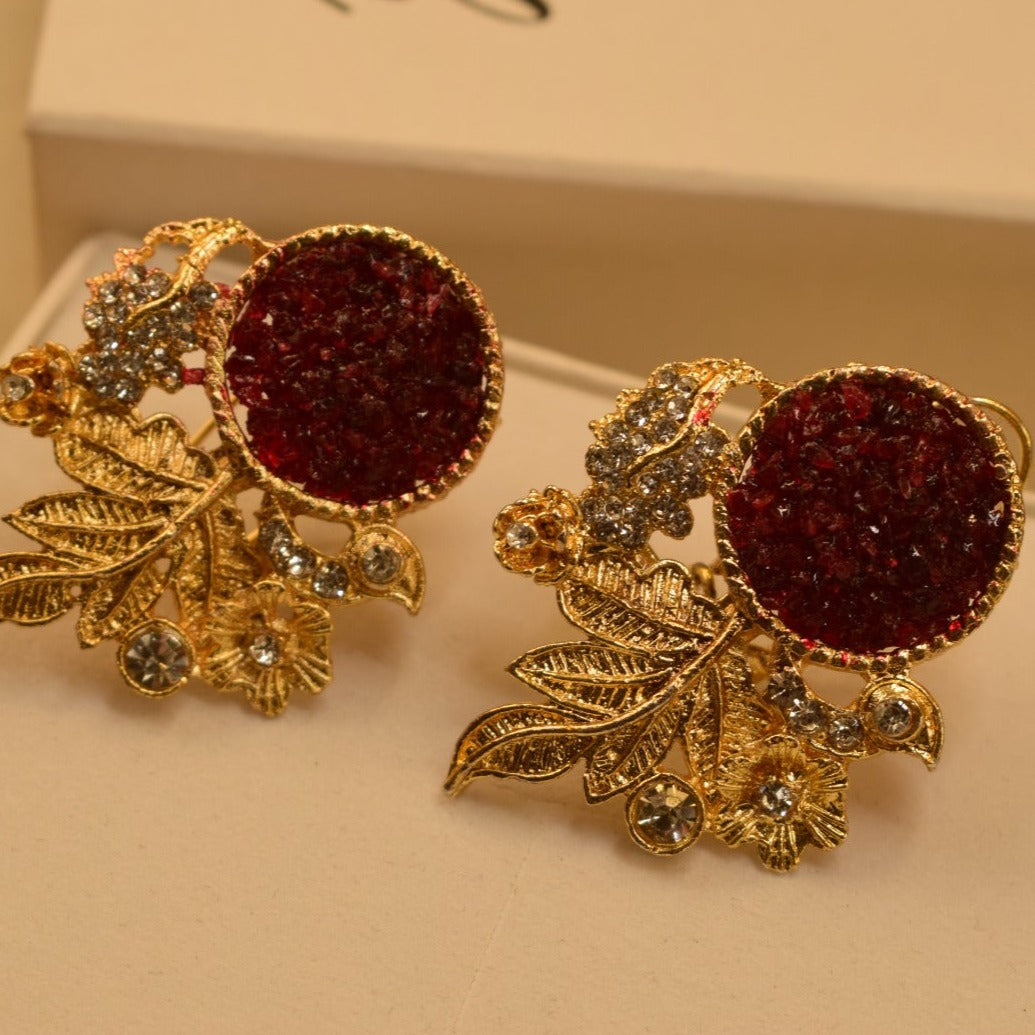 Fancy Leaf Design Golden White/Maroon/Green/Black/Shampion/Pink/Blue/ Stones Earrings For Girls/women.