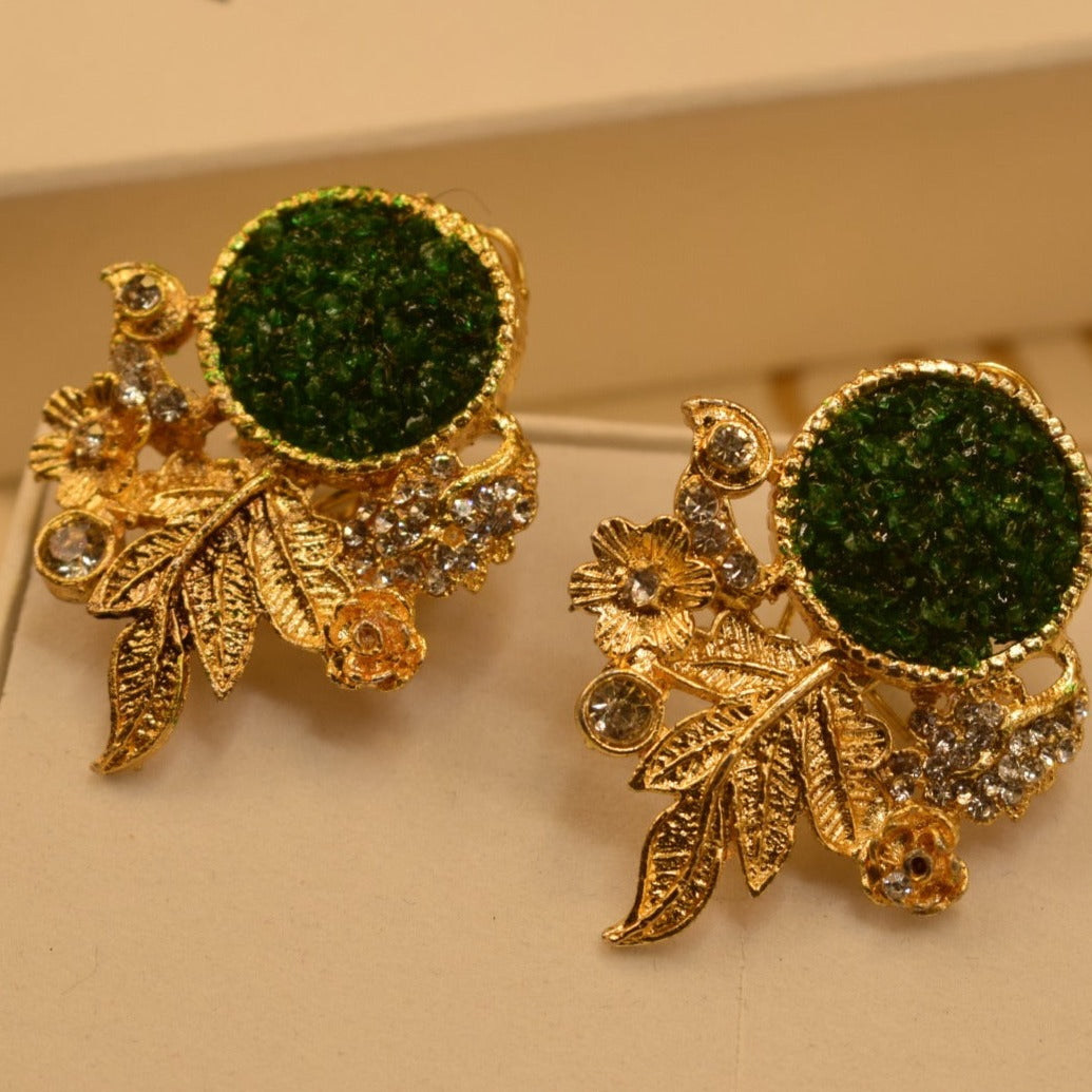 Fancy Leaf Design Golden White/Maroon/Green/Black/Shampion/Pink/Blue/ Stones Earrings For Girls/women.